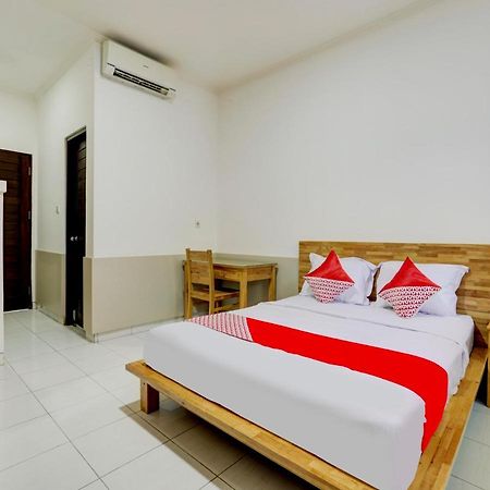 Oyo Flagship 90754 Alamanda Guesthouse 丹帕沙 外观 照片