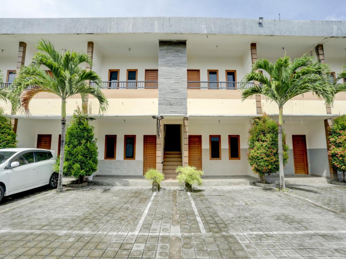 Oyo Flagship 90754 Alamanda Guesthouse 丹帕沙 外观 照片