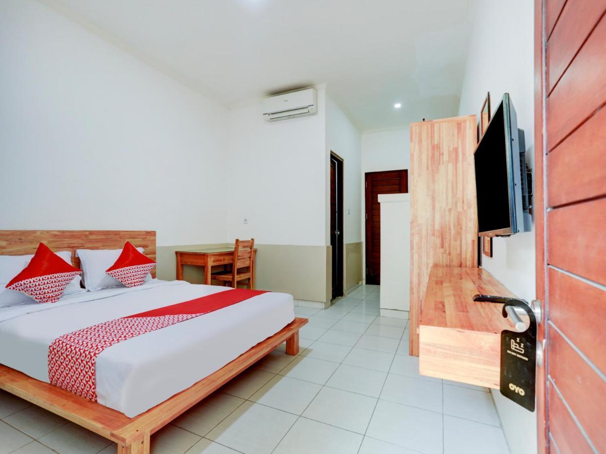Oyo Flagship 90754 Alamanda Guesthouse 丹帕沙 外观 照片